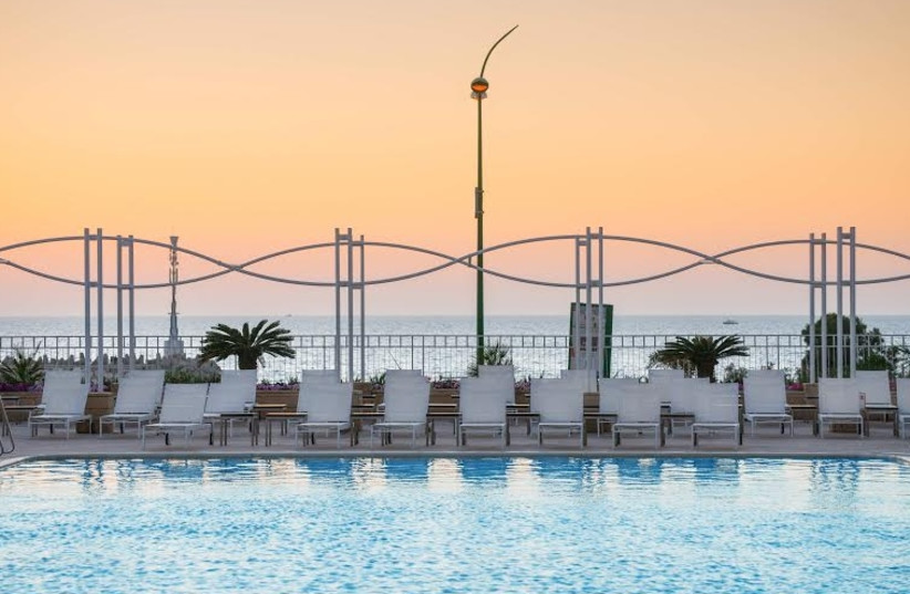 Sunset at the Leonardo Hotel Ashkelon’s pool (photo credit: Courtesy)
