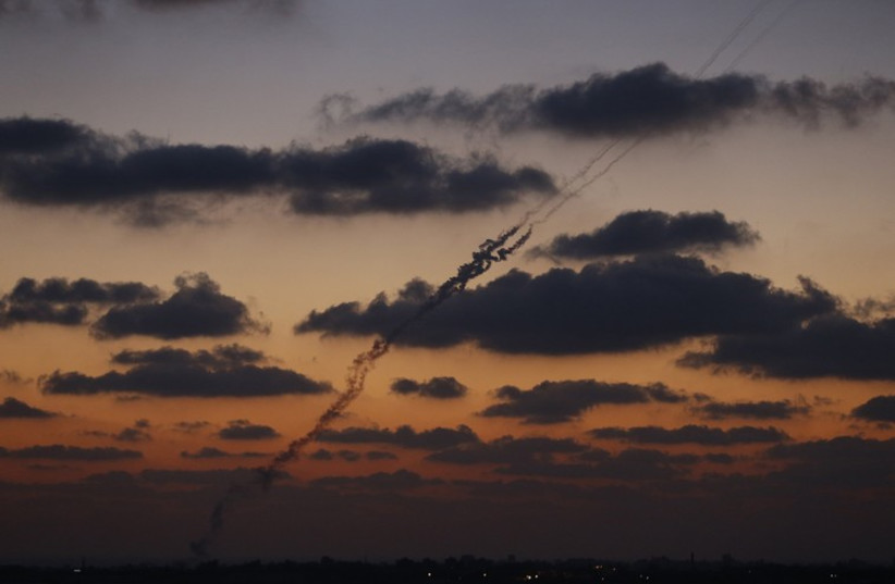 A smoke trail is seen as a rocket is launched from the northern Gaza Strip towards Israel July 16, 2014. (photo credit: REUTERS)