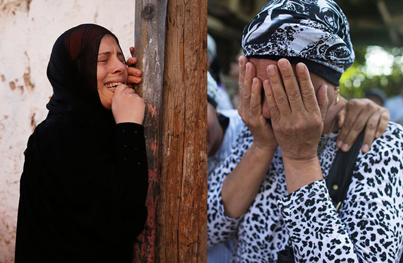 Israeli and Palestinian woman mourns (photo credit: REUTERS)