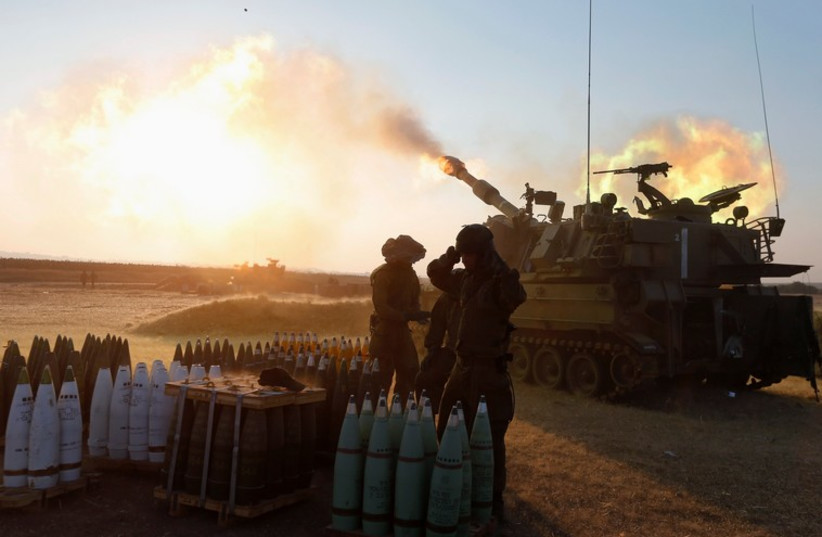 An Israeli mobile artillery unit fires towards the Gaza Strip July 21 (photo credit: REUTERS)
