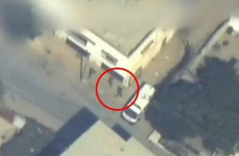 IDF surveillance of Gaza terrorists boarding an ambulence and appear to be escaping.  (photo credit: IDF SPOKESMAN'S OFFICE)