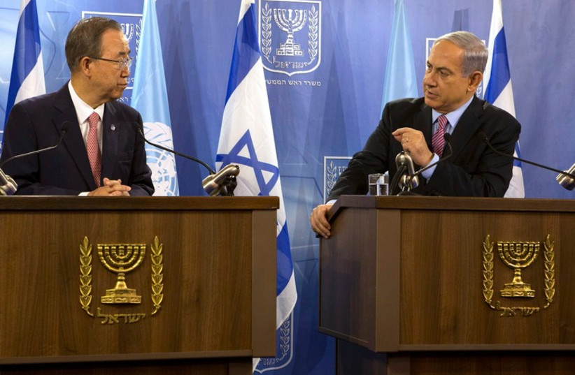 Israeli Prime Minister Benjamin Netanyahu (R) gestures as he speaks during a joint news conference with U.N. Secretary General Ban Ki-Moon at the Defence Ministry in Tel Aviv July 22, 2014. (photo credit: REUTERS)