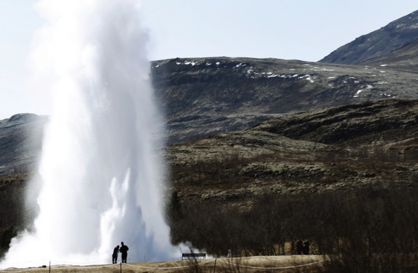 A geyser in Geysir, Iceland. (photo credit: BOB STRONG / REUTERS)