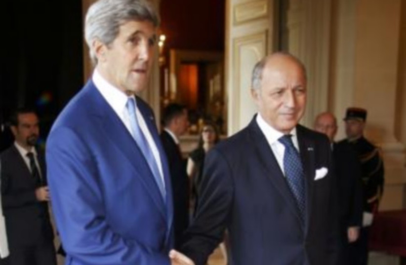US Secretary of State John Kerry (L) and France's Foreign Minister, Laurent Fabius, in Paris July 26, 2 (photo credit: REUTERS)