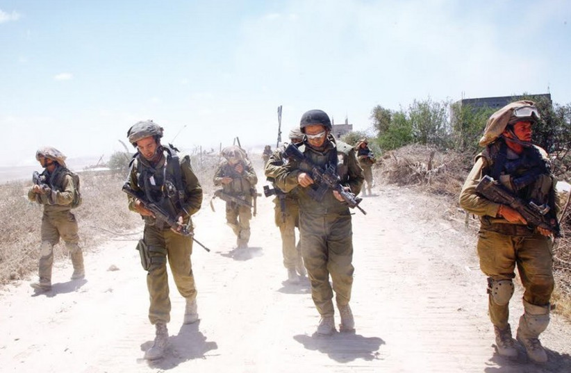 IDF soldiers take part in Operation Protective Edge. (photo credit: ANNA GOLIKOV)