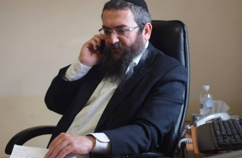 The rabbi at his desk (photo credit: SAM SOKOL)