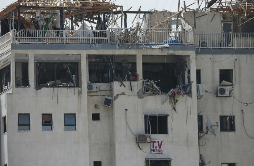 Damage is seen at Hamas' Al-Aqsa TV office. (photo credit: REUTERS)