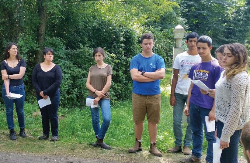 Students of the Gidonim Reut High School traveled to Poland to spend eight days cleaning up and restoring the Jewish cemetery in Czestochowa. (photo credit: Courtesy)