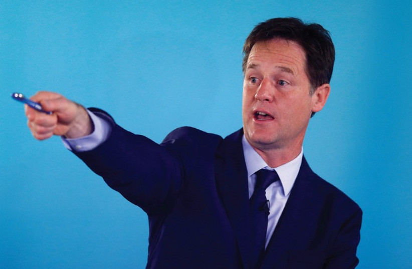 BRITAIN’S DEPUTY Prime Minister Nick Clegg takes questions after speaking about international development in London in May (photo credit: REUTERS)