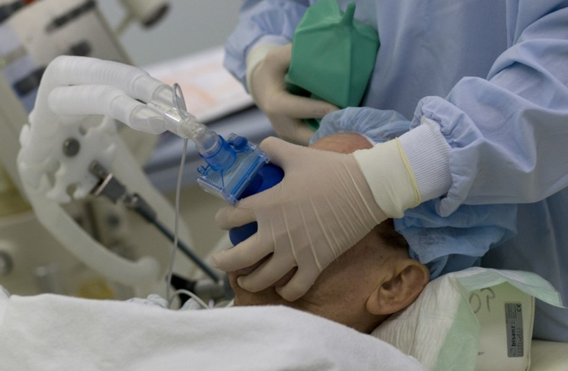 An amputee patient with MRSA (Methicillin resistant Staphylococcus Aureus) is pictured during surgery to clean his wound, in the operating theatre of the Unfallkrankenhaus Berlin (UKB) hospital in Berlin February 29, 2008 (photo credit: REUTERS)