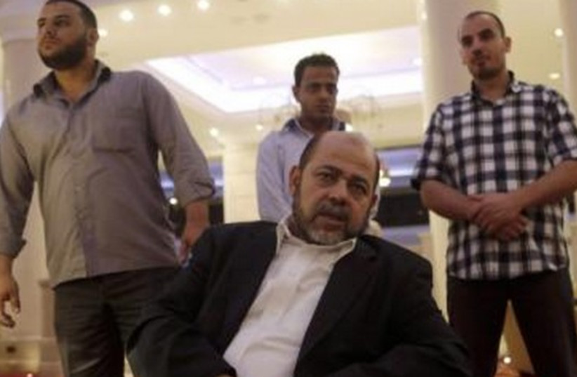 Deputy chairman of Hamas' political bureau Moussa Abu Marzouk during an interview in Cairo, August 9, 2014. (photo credit: REUTERS)
