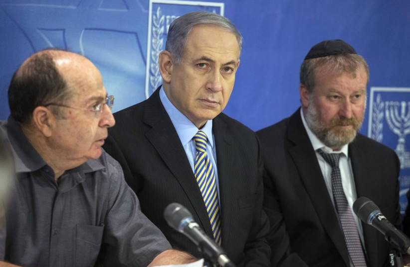 Netanyahu and Ya'alon at a cabinet meeting in Tel Aviv August 10, 2014. (photo credit: REUTERS)