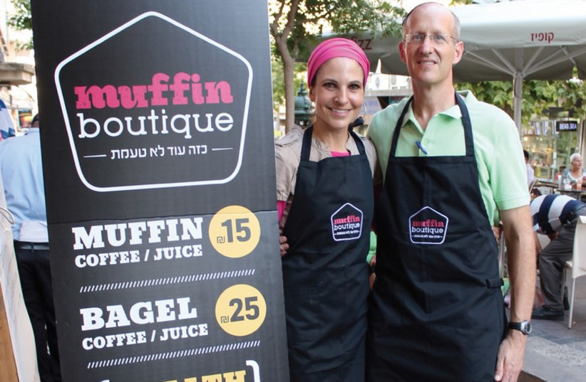 Shmarya and Lainie Richler stand outside their new downtown cafe, Muffin Boutique. (photo credit: Courtesy)