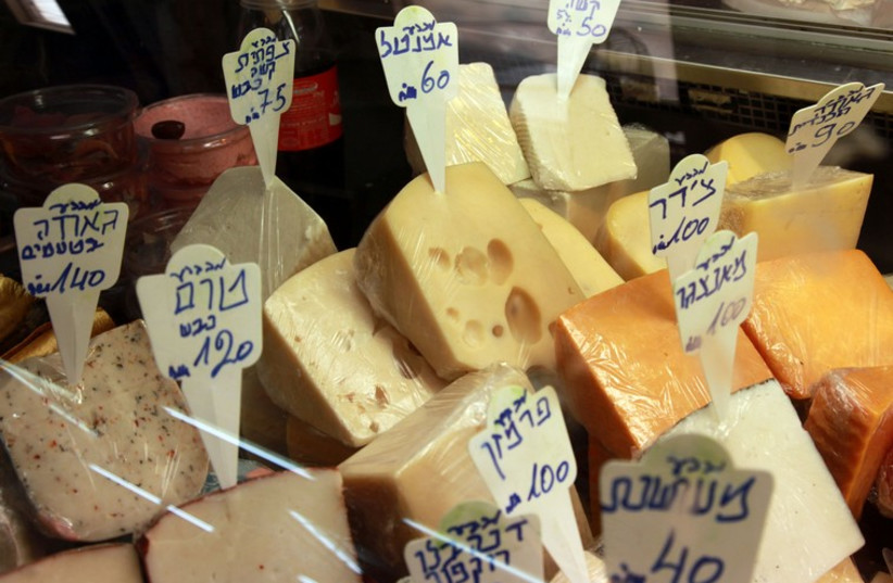 Cheese at a shop in Jerusalem's Machane Yehuda. (photo credit: MARC ISRAEL SELLEM)