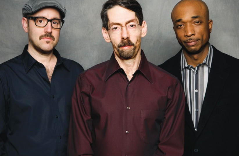 Jazz pianist Fred Hersch (middle) seen here with trio members John Hébert (left) and Eric McPherson. (photo credit: MATTHEW RODGERS)