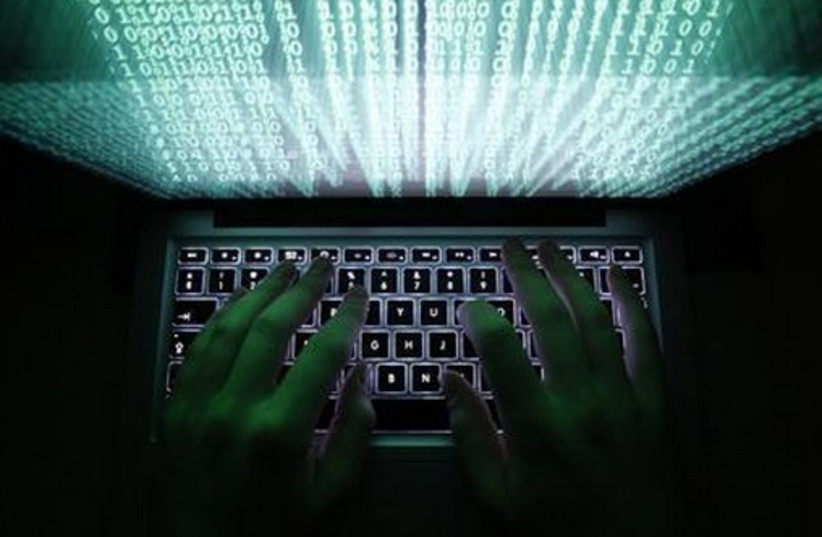 Cyber hackers [illustrative] (photo credit: REUTERS)