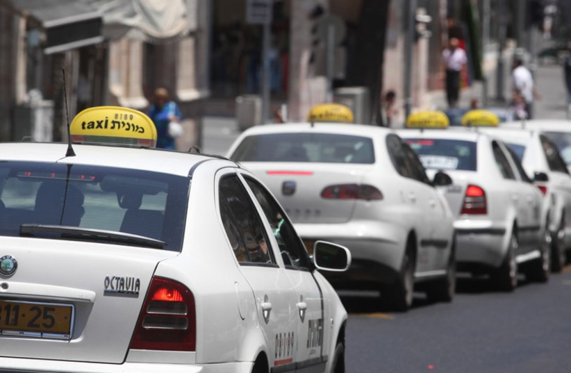 Taxis in Israel (photo credit: MARC ISRAEL SELLEM/THE JERUSALEM POST)