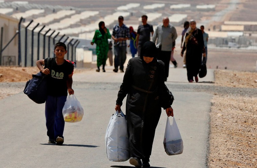Syrian refugees in Jordan, August 2014. (photo credit: REUTERS)