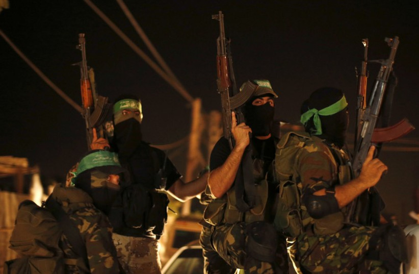 Hamas militants (photo credit: REUTERS)