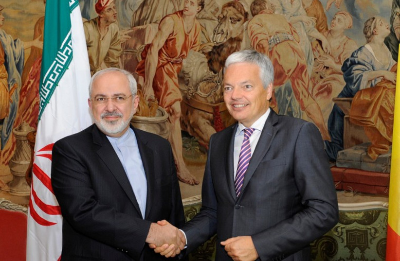 Iran's Foreign Minister Mohammad Javad Zarif with Belgium's Minister of Foreign Affairs Didier Reynders. (photo credit: REUTERS)
