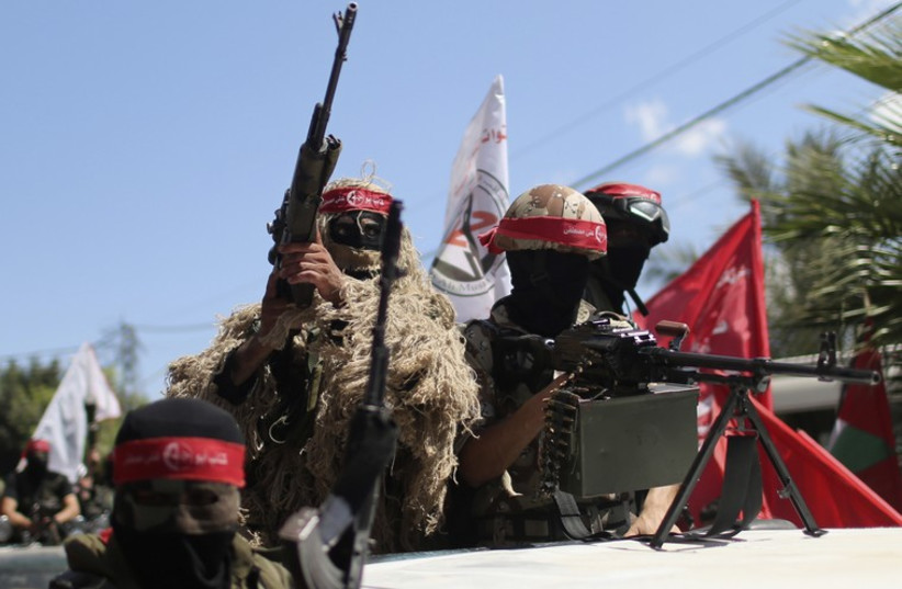 Palestinian militants from the Popular Front for the Liberation of Palestinian (PFLP) take part in a military show in Gaza City September 2 (photo credit: REUTERS)