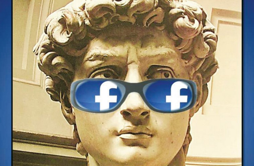 The statue of David, by Michelangelo, gets an update with sunglasses with the Facebook logo in the frames. (photo credit: COURTESY KARNI GAMLIEL)