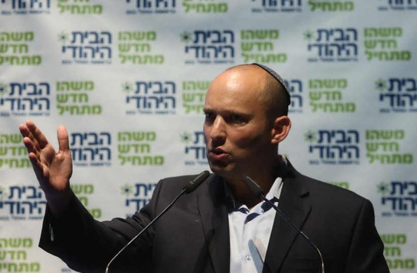 Naftali Bennett at a Bayit Yehudi convention at Tel Aviv University, September 10, 2014. (photo credit: MARC ISRAEL SELLEM/THE JERUSALEM POST)
