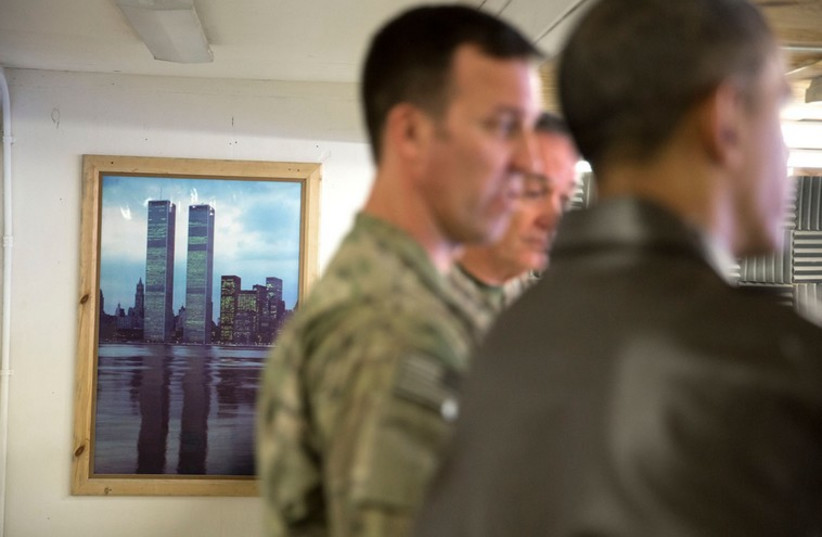 A poster of the World Trade Center hangs on a wall at Bagram Airfield, Afghanistan, Sunday, May 25, 2014 (photo credit: OFFICIAL WHITE HOUSE PHOTO BY PETE SOUZA)