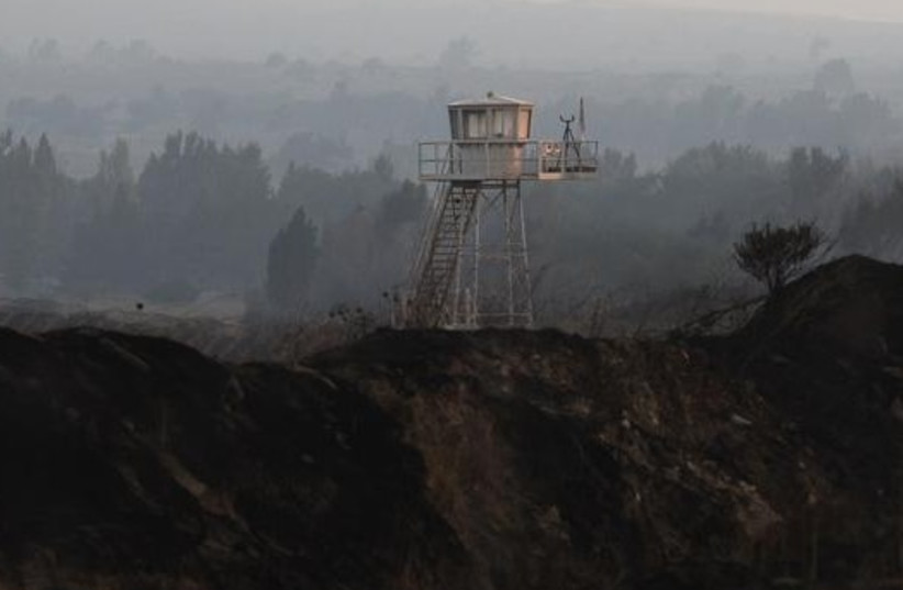  A UN observation tower is seen overlooking Syria, next to the Quneitra border crossing between the Golan Heights in Israel and Syria. (photo credit: REUTERS)
