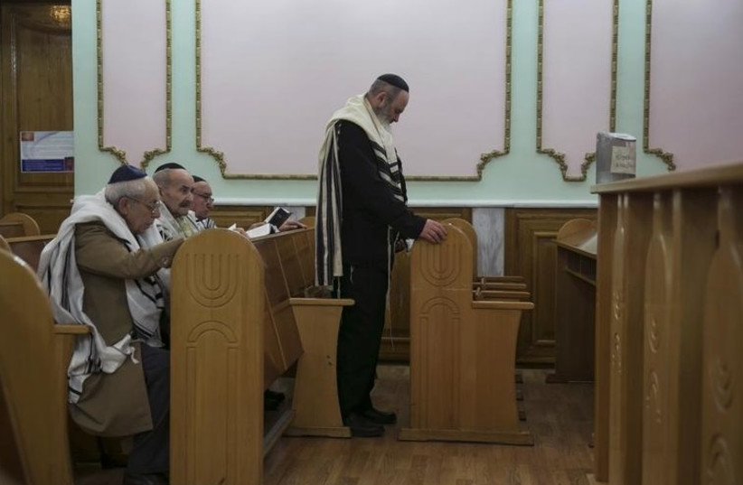 Jewish men at a synagogue in Donetsk, eastern Ukraine.  (photo credit: REUTERS)