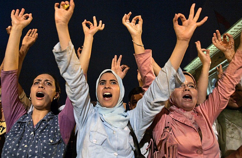 Moroccan youth demonstrate against the government (photo credit: REUTERS)