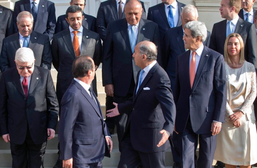 World leaders gather in Paris yesterday to discuss action against Islamic State. (photo credit: REUTERS)