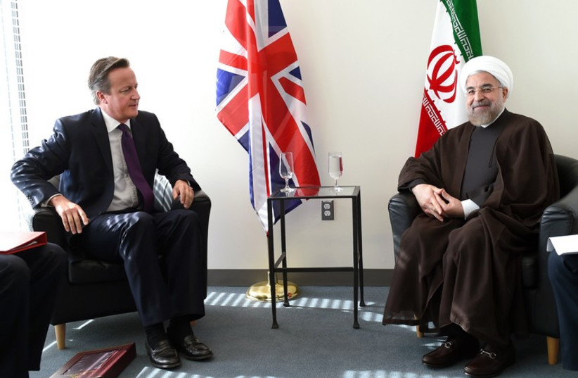 Britain's Prime Minister David Cameron meets with Iran's President Hassan Rouhani at UN General Assembly, September 24 (photo credit: REUTERS)