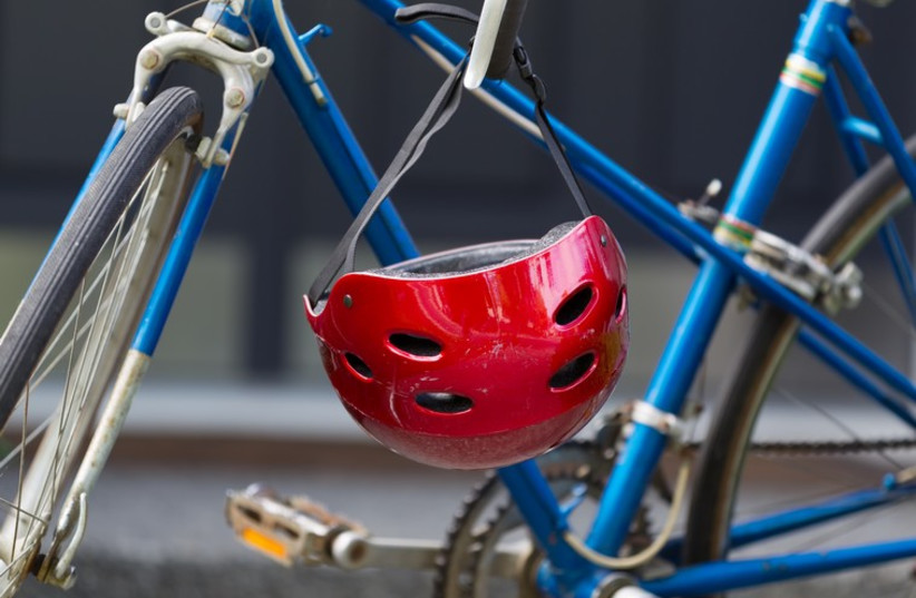 Bicycle and helmet [illustrative] (photo credit: INGIMAGE)