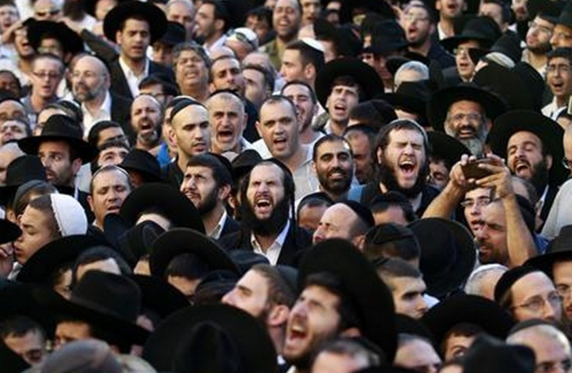 Ultra-Orthodox Jews attend the funeral of late Shas spiritual leader Rabbi Ovadia Yosef (photo credit: REUTERS)