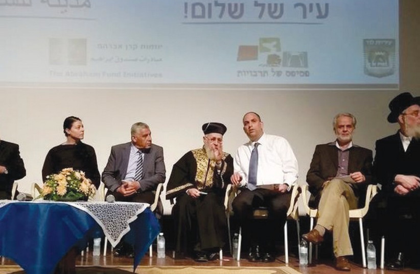 Jewish and Muslim leaders gather in Lod, September 1, 2014.  (photo credit: MINO WAHIDY)
