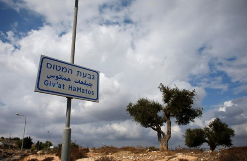 A signpost in the Givat Hamatos section of east Jerusalem (photo credit: REUTERS)