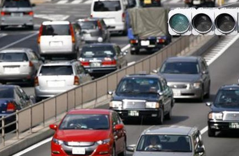 Cars on a highway [illustrative] (photo credit: REUTERS)