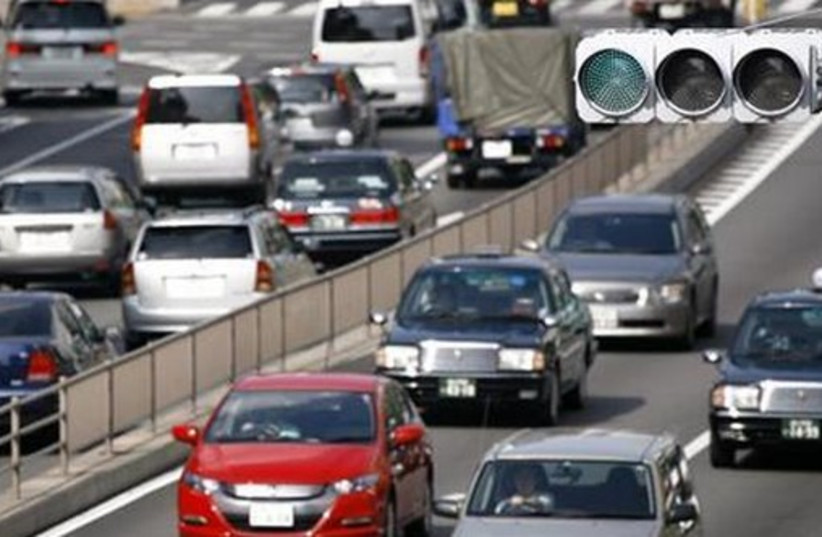 Cars on a highway [illustrative] (photo credit: REUTERS)