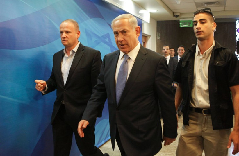 Prime Minister Benjamin Netanyahu arrives at a cabinet meeting in Jerusalem October 7 (photo credit: REUTERS)