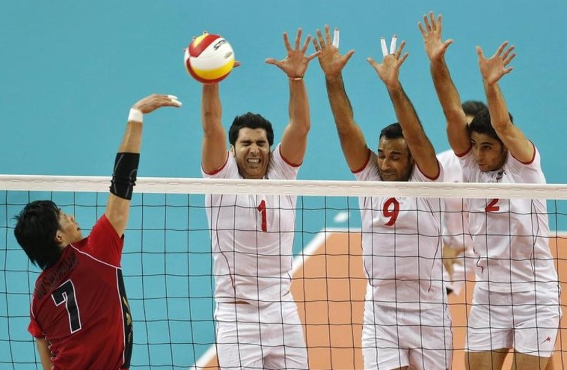 Members of Iran's men's volleyball team during the gold medal match against Japan. (photo credit: REUTERS)