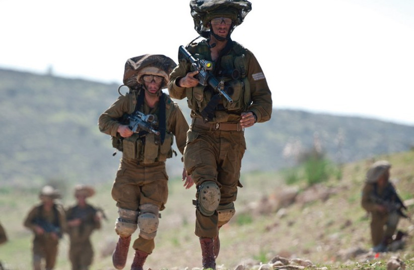 IDF PARATROOPERS return after an intensive week of training. (photo credit: IDF SPOKESMAN’S UNIT)