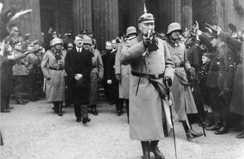 Hindenburg and Hitler during the national day of mourning, Feb. 25, 1934 (photo credit: WIKIMEDIA COMMONS/GERMAN FEDERAL ARCHIVE)