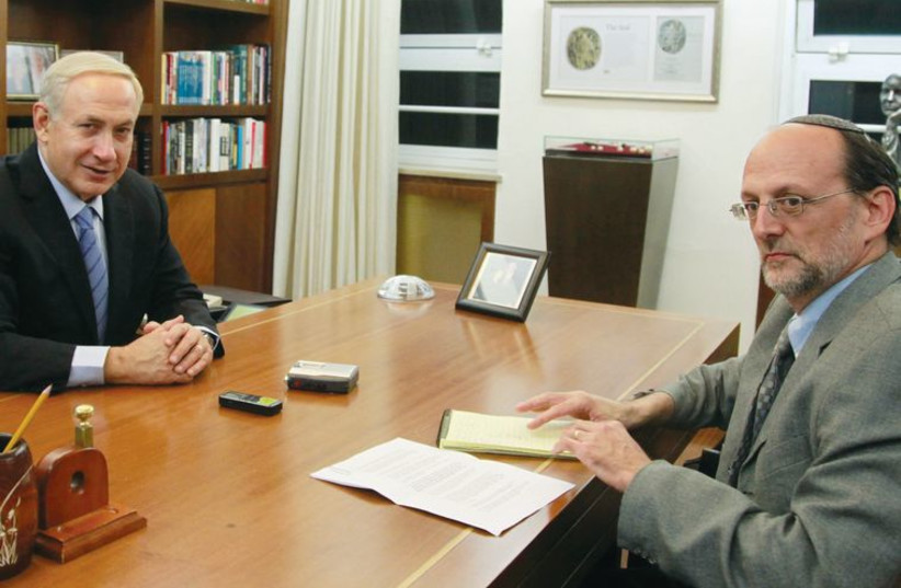 Herb Keinon interviewing Prime Minister Benjamin Netanyahu. (photo credit: MARC ISRAEL SELLEM/THE JERUSALEM POST)