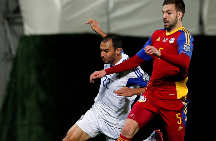  Israel's Omer Damari (L) fights for the ball against Andorra's Emili Garcia (photo credit: REUTERS)