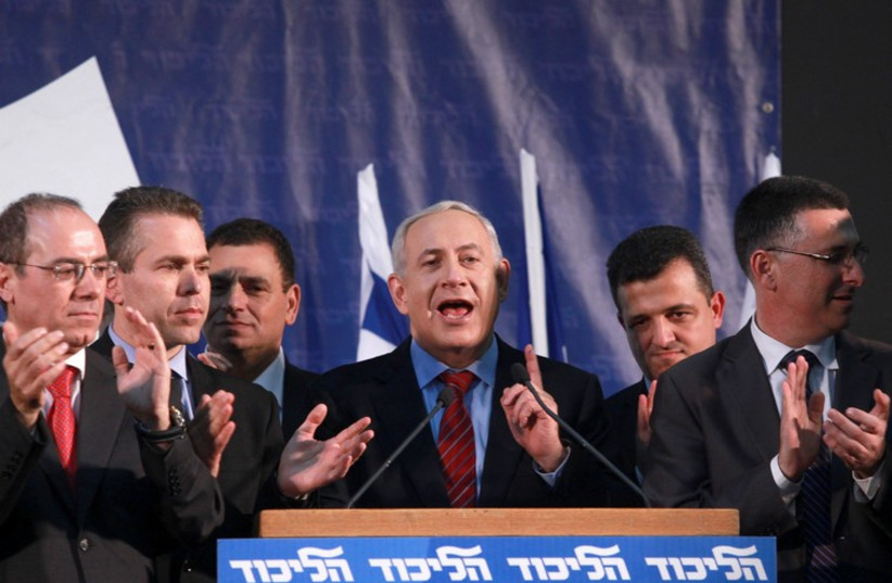 Prime Minister Benjamin Netanyahu (C) with Likud members at the party's primaries in 2012 (photo credit: MARC ISRAEL SELLEM/THE JERUSALEM POST)