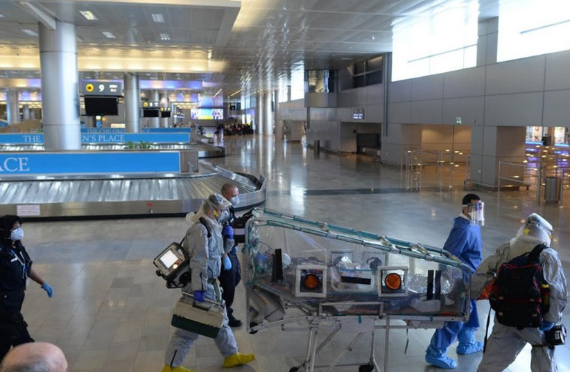 Ebola screening drill held at Ben-Gurion Airport, October 17, 2014. (photo credit: KOBI GIDEON/GPO)