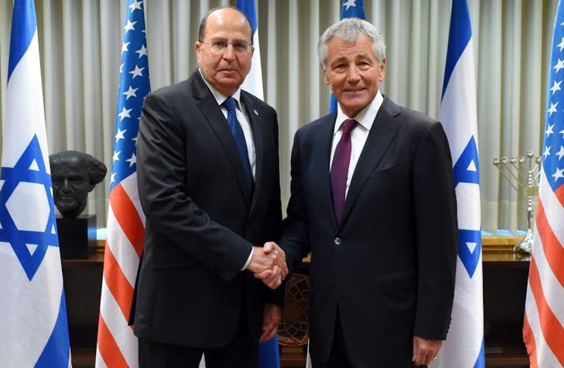 Defense Minister Moshe Ya'alon (L) and US Defense Secretary Chuck Hagel meet in Jerusalem (photo credit: ARIEL HERMONI / DEFENSE MINISTRY)