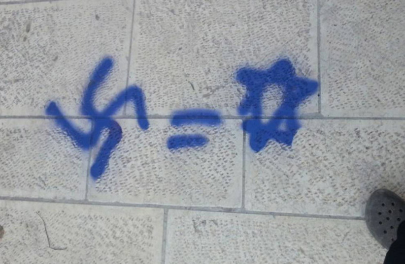 Swastika graffiti at the Temple Mount (photo credit: BASHI DARSHAN/TAZPIT)