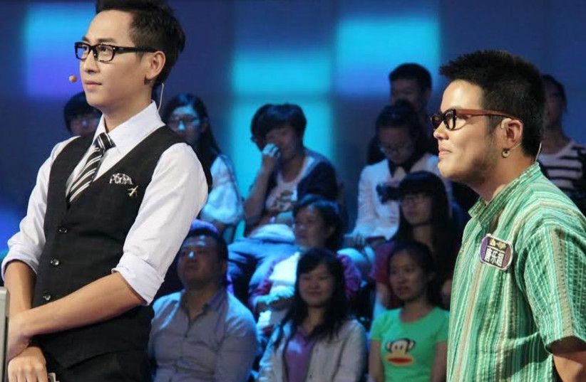  Lechao Tang (right) participating in Chinese game show. (photo credit: CHINA TV)